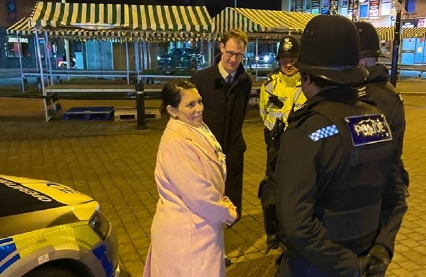 Tom Randall MP and the Home Secretary in Arnold Market chatting with Police Officers from Gedling’s Neighbourhood Policing teams on Friday 28 January 2022